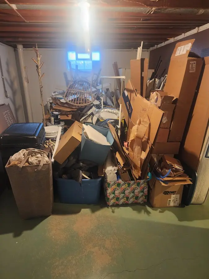 Roll-off dumpster container at job site for 15 Yard Dumpster Rental in West Pikeland